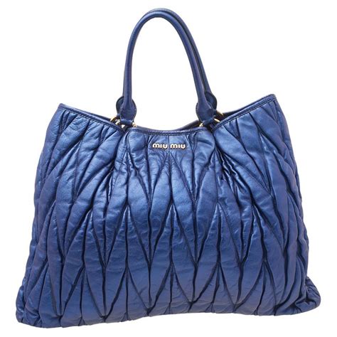 miu miu lapis blue matelasse tote|Leather and Woven Designer Tote Bags For Women .